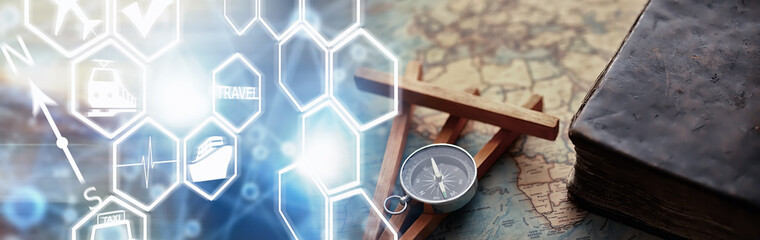 Travel and adventure search concept. Vintage aged map with a shabby book and compass. Shabby book...