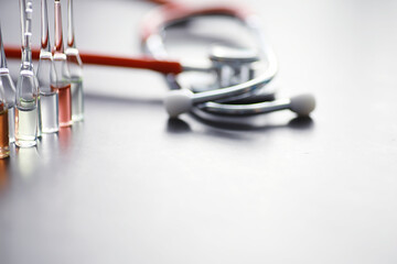 Test tubes with drugs and tests to test the victims and treat the infected. Ampoules with medicines. Set of test tubes with medicine.