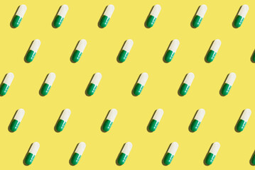 seamless pattern of green pills