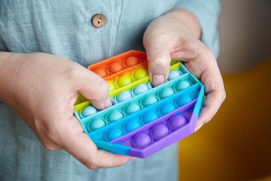 Push Pop Bubble Sensory Fidget Toy In Hands