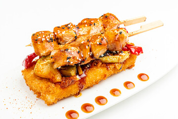 chicken kebab with vegetables on the white