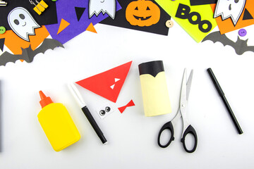 Craft with a child for Halloween from rolls of toilet paper and black paper bat. Step-by-step instruction. step 2.