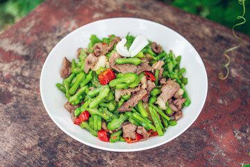 A dish of fried pork with concanavali beans in Hunan, China