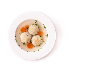 Traditional Jewish matzah ball soup isolated on white background