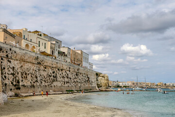 Beach in September on the waterfront of Otranto, Salento, Puglia, Italy