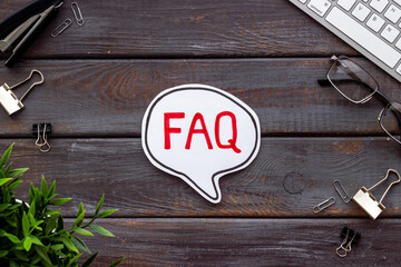 Business concept faq frequently asked questions with keyboard