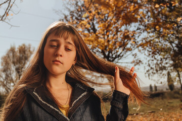 Girl in autumn park