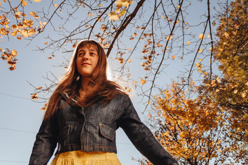 Girl in autumn park