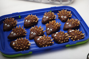 Delicious Chocolate hedgehog cakes on blue tray