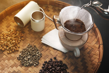 Soft focus coffee drip, organic brand. Hot coffee and smoke.