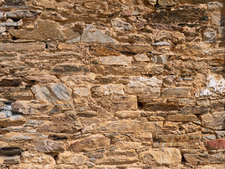 Natural bright yellow limestone wall background