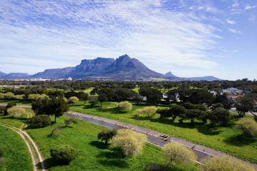 Papier Peint photo autocollant Montagne de la Table Aerial drone view of the eastern side of Table Mountain during the day, as viewed from Pinelands.