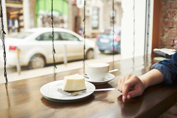 woman sitting at a table in a cafe rest Lifestyle