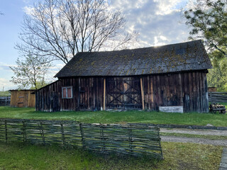 old wooden brown barn in the countryside