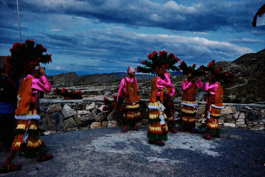 Group of Mexican traditional dancers, Matachines, getting ready.