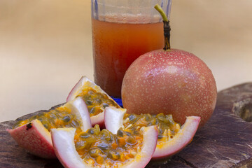 Organic Passiflora edulis or Purple passion fruit and a glass of juice