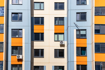 Obraz premium Multi-storey modern residential building. Housing construction. Residential fund. Sleeping residential area. Mortgage loans for young families.