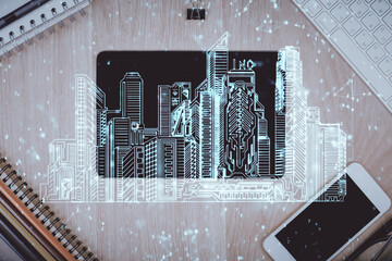 Multi exposure of smart city technology drawing over table with phone. Top view.