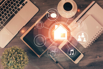 Multi exposure of smart city technology drawing over table with phone. Top view.