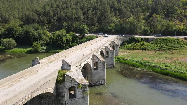 Aerial view of Nineteenth-century bridge over the Yantra River, known as the Kolyu Ficheto Bridge in Byala, Ruse region, Bulgaria