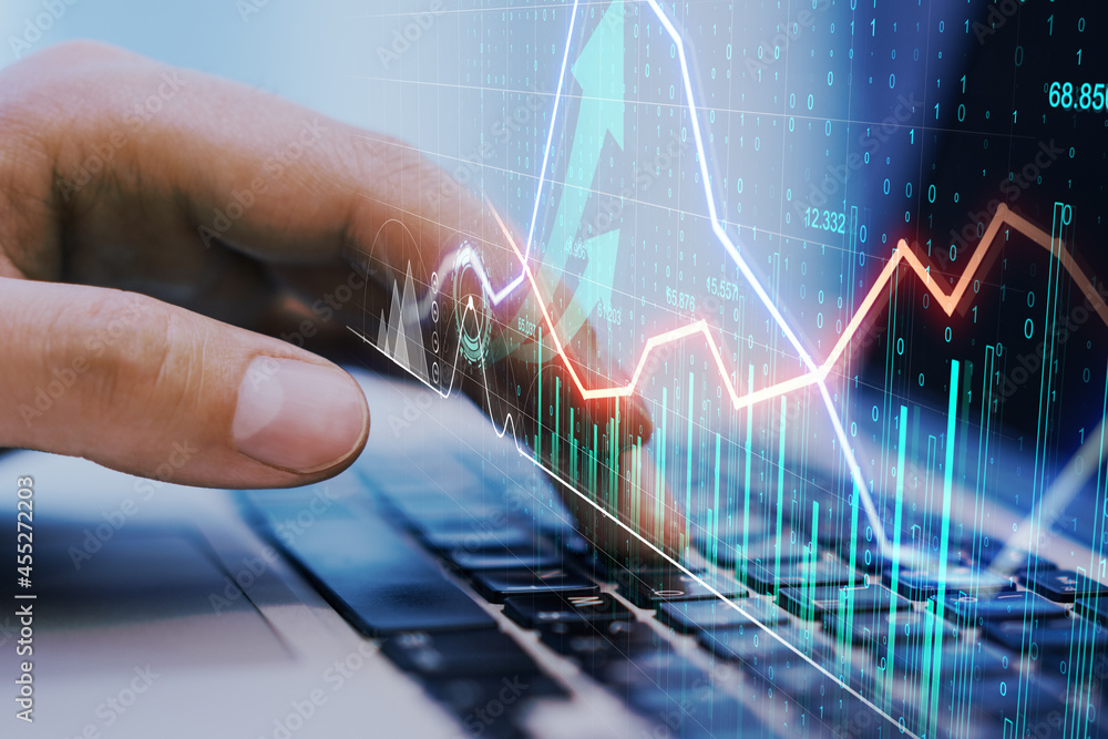 Poster close up of hands using laptop with creative glowing business chart and arrows.