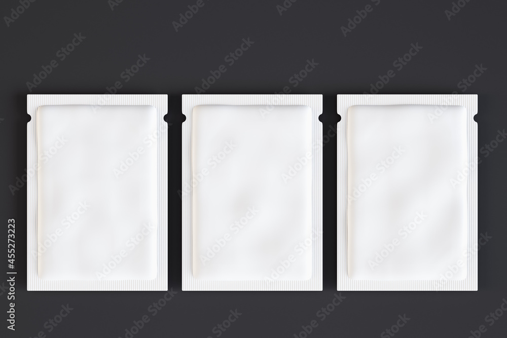 Aufkleber Three empty white product packets on dark background. Mock up, 3D Rendering.