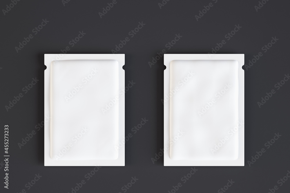 Aufkleber Two empty white product packets on dark background. Mock up, 3D Rendering.