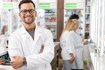 Portrait of male pharmacist in drugstore. - obrazy, fototapety, plakaty