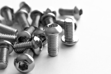Stainless steel button head allen bolt.   Socket button head cap screw on the table.