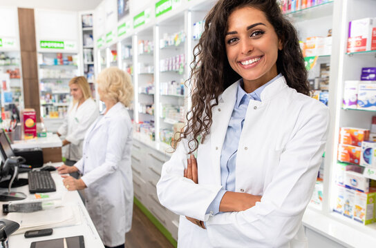 Portrait of female pharmacist in drugstore.