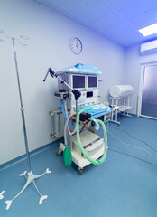 Hospital newborn emergency ward. Child health emergency treatment. Little special bed for infants. Vertical view
