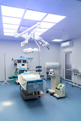 Healthcare surgery technologies. Modern hospital operation empty room. Quarantine medical operating room with lights