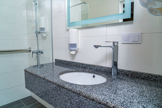 Bathroom in clinic. Newly built hospital with modern interior convenient for patients. Closeup