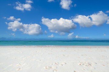 Closeup sea sand beach. Panoramic beach landscape. Inspire tropical beach seascape horizon. Blue sunny sky calmness tranquil relaxing sunlight summer mood. Vacation travel holiday banner