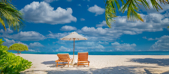 Amazing tropical island shore, two sun beds loungers, umbrella palm tree on white sand, sea view...