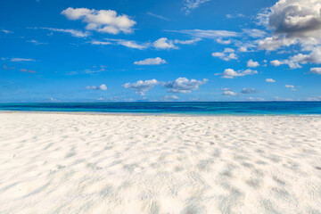 Closeup sea sand beach. Panoramic beach landscape. Inspire tropical beach seascape horizon. Blue sunny sky calmness tranquil relaxing sunlight summer mood. Vacation travel holiday banner