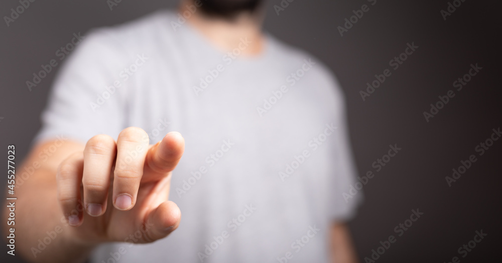 Poster Hand pushing on a touch screen..