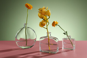 Flower in glass vase. glass vase realistic mockup. Crystal cup for flowers or cold beverage with...