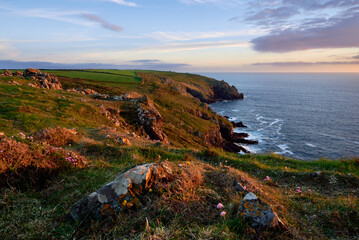 Sunset over Higher Predannack Cliff. Lizard Peninsula, Cornwall, UK