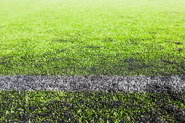 Washed white football pitch - out and out - team debut on the field