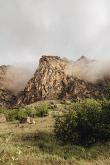 Steep mountains in the fog