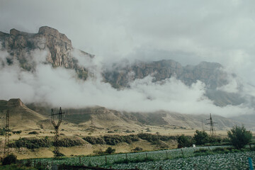 Steep mountains in the fog