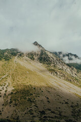Steep mountains in the fog