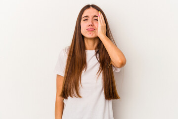 Young caucasian woman isolated on white background tired and very sleepy keeping hand on head.