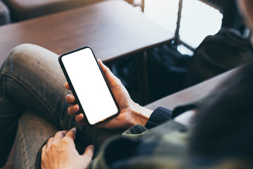 cell phone blank white screen mockup.woman hand holding texting using mobile on desk at office.background empty space for advertise.work people contact marketing business,technology