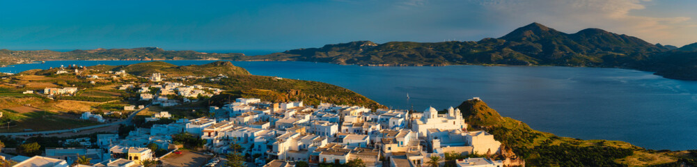 View of Plaka village on Milos island on sunset in Greece