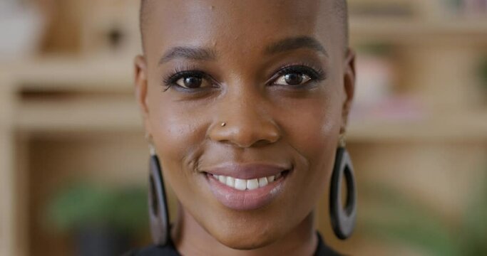 Portrait happy african american woman smiling at home