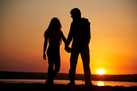 silhouette of  young couple