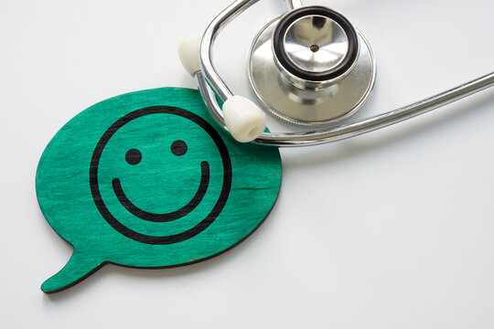 Patient satisfaction concept. Stethoscope and smiley face.