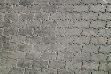 Urban street tiled pavement of grey color, texture or background